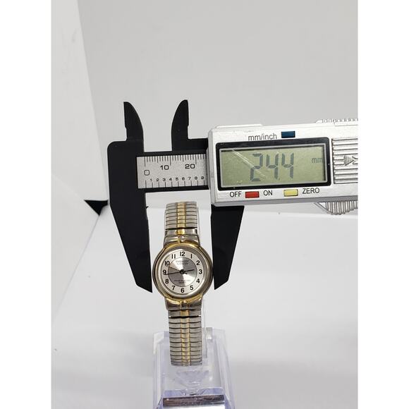 Embassy by Gruen women\'s dress watch. Silver and gold. W1714, 168, PC21S